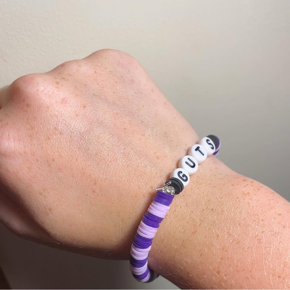 purple olivia Rodrigo guts bracelet
